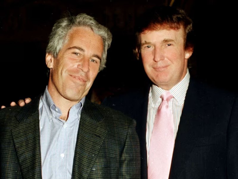 Jeffrey Epstein and Donald Trump post for a photo together