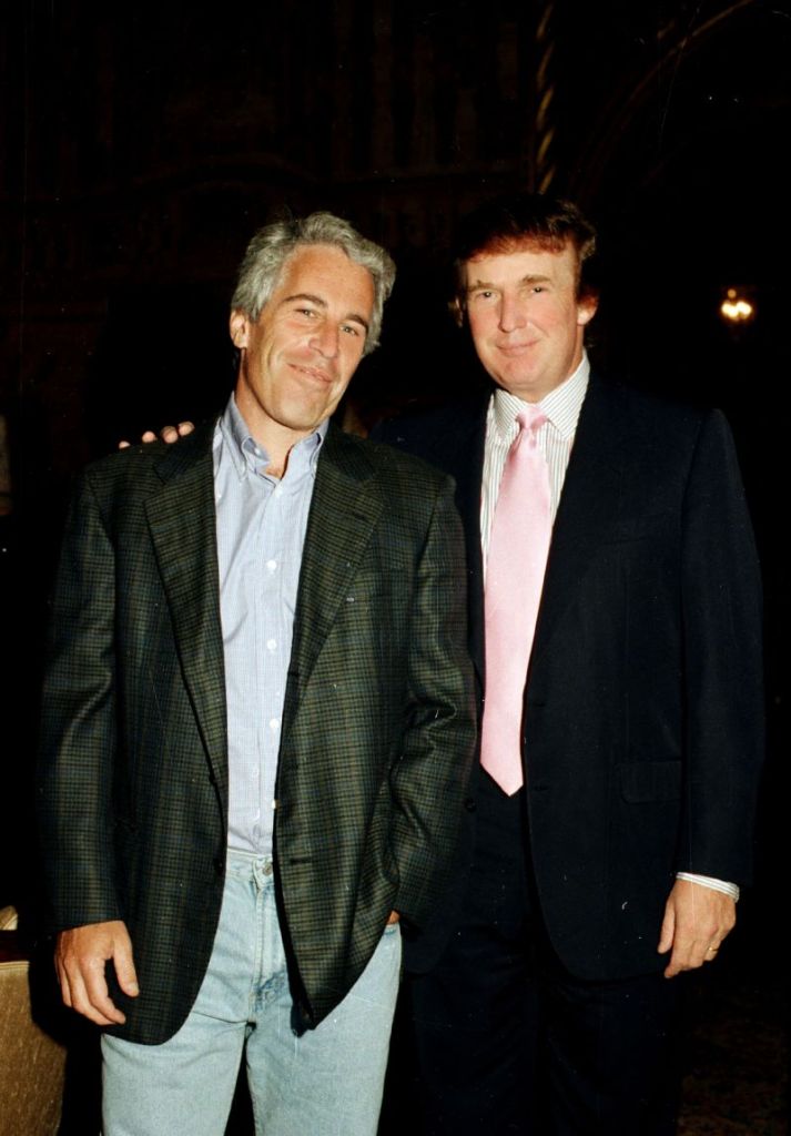 Jeffrey Epstein and Donald Trump post for a photo together