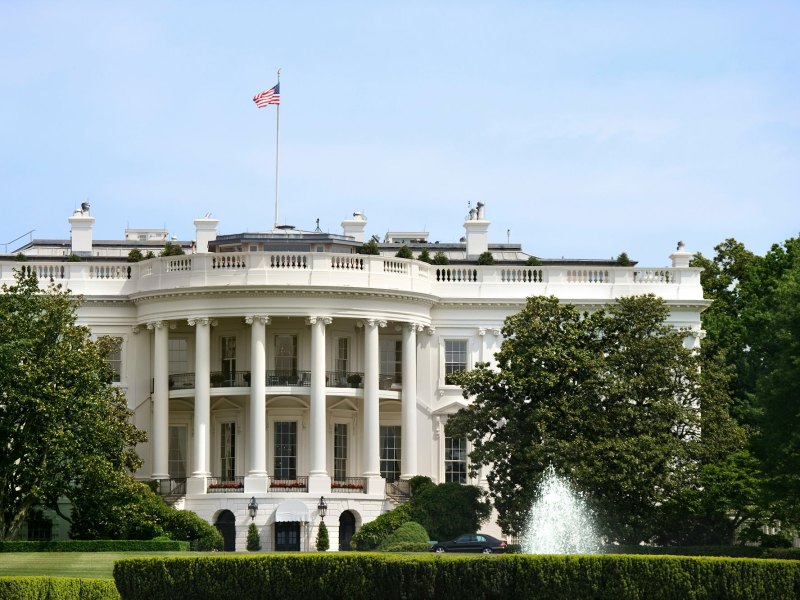 The White House with a fountain in front of it
