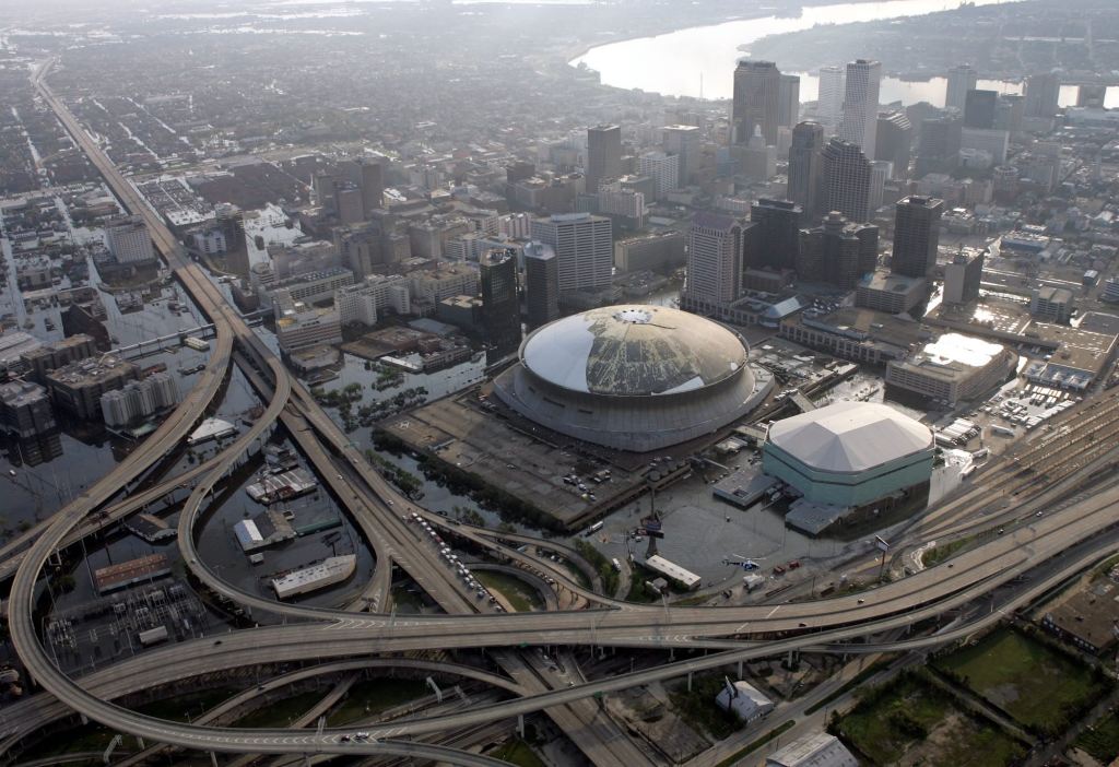 an aerial view of the superdome in flooded new orleans