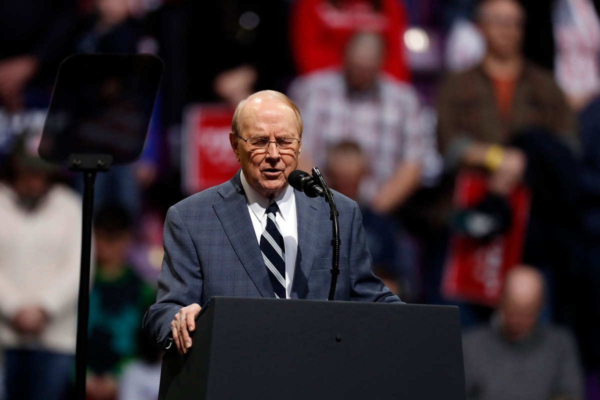 James Dobson speaks at a podium at an event