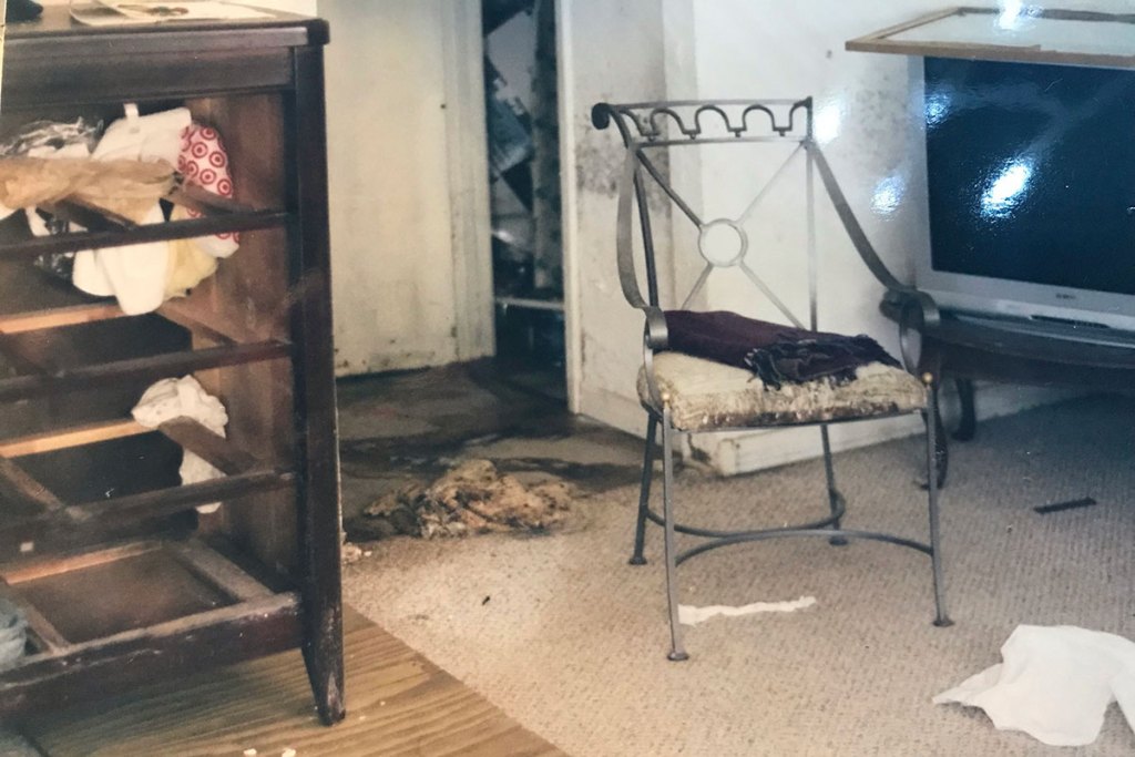 Flood damage seen in a bedroom