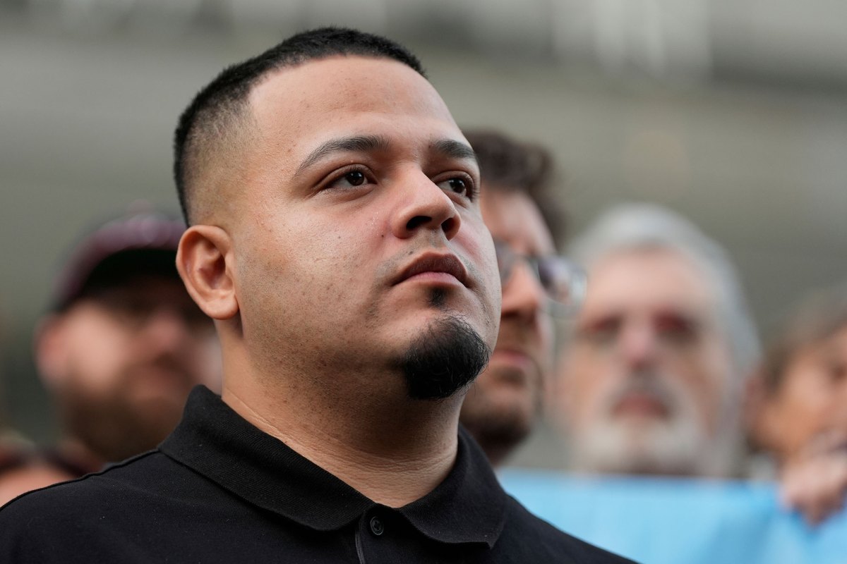 Closeup of Kilmar Abrego Garcia looking up in a crowd