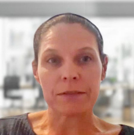 A screenshot of a woman talking in a zoom screen