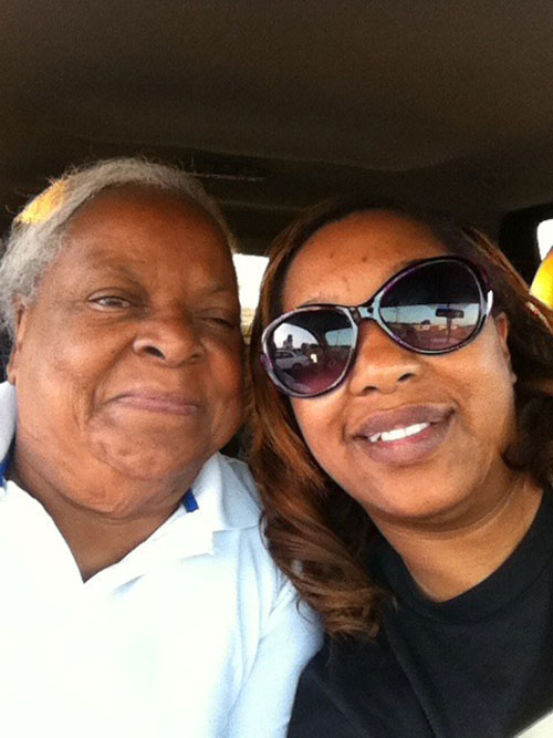 A car selfie with a mom and her adult daughter