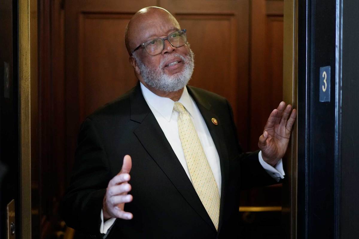 Rep. Bennie Thompson walking through a doorway