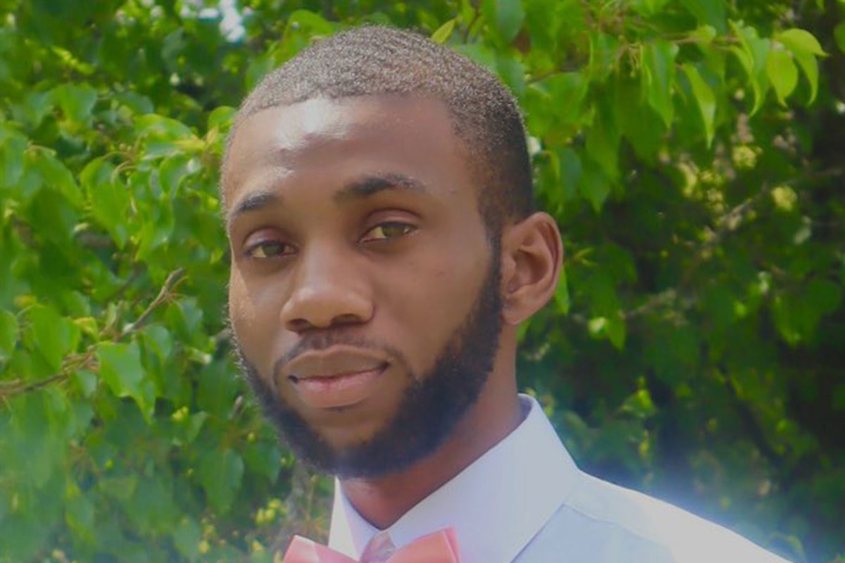 Demartravion Reed standing outside by greenery