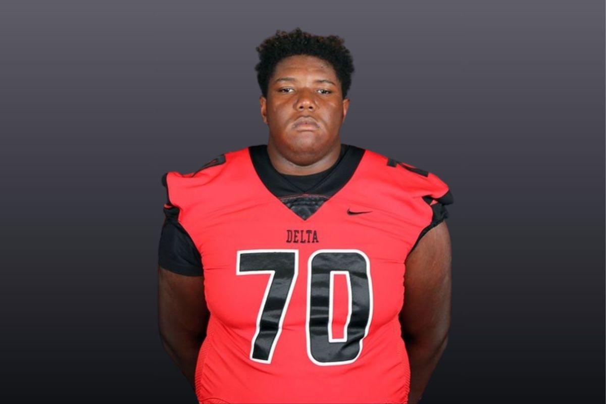 Emanuell Cook wearing a red Delta number 70 jersey for his football profile photo