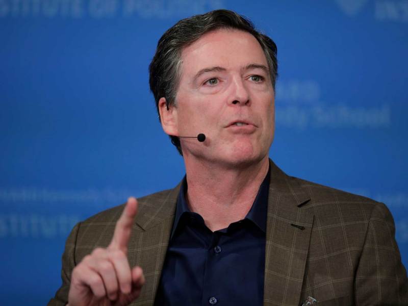 James Comey seem speaking at an event