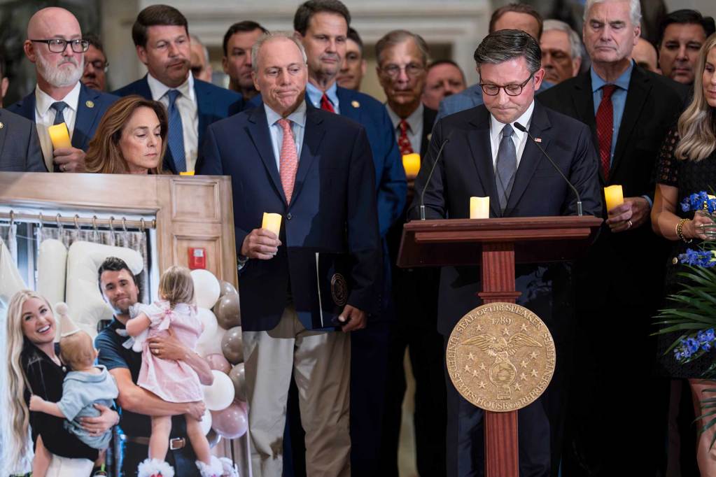 Mike Johnson leading a vigil at the Capitol for Charlie Kirk, photo seen on the left