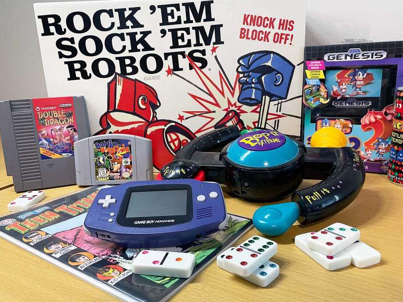A setup showing all sorts of games, from video games to dominoes