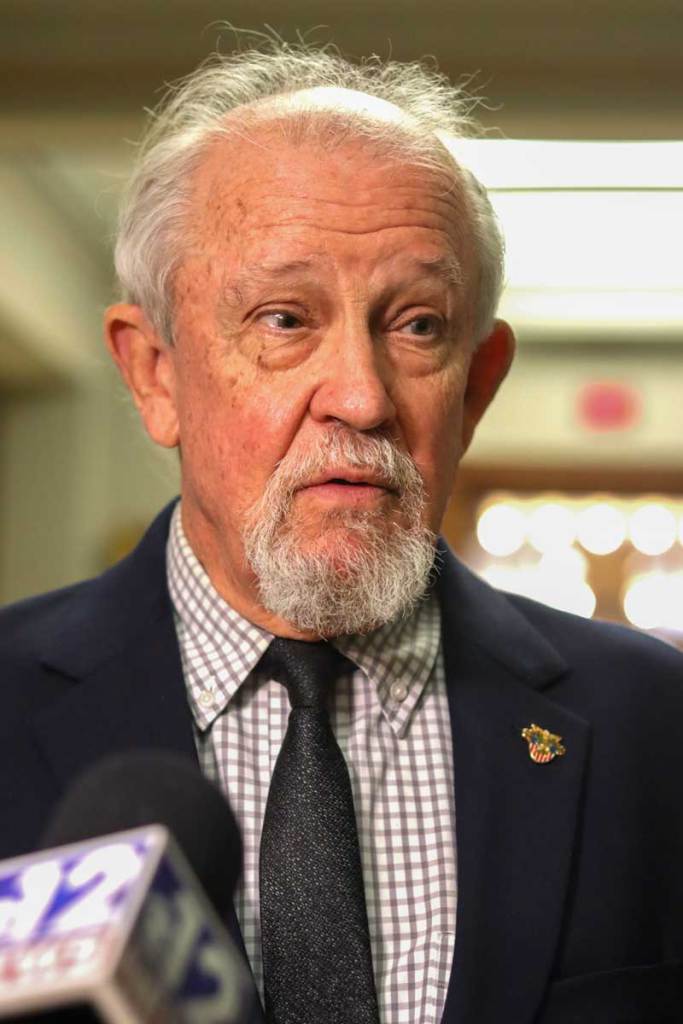 Ashby Foote taking questions from reporters after a meeting
