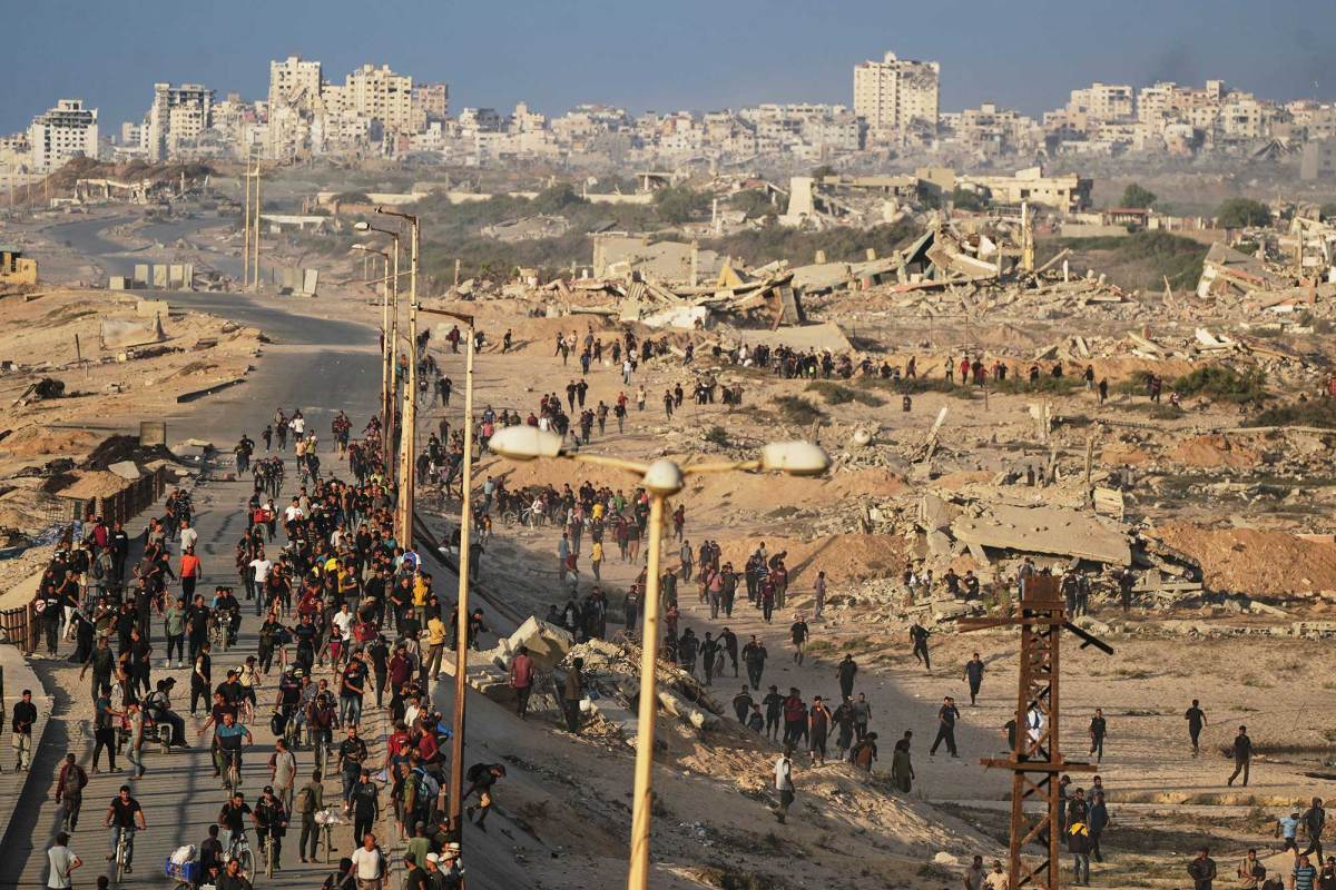 People stream out of Gaza City