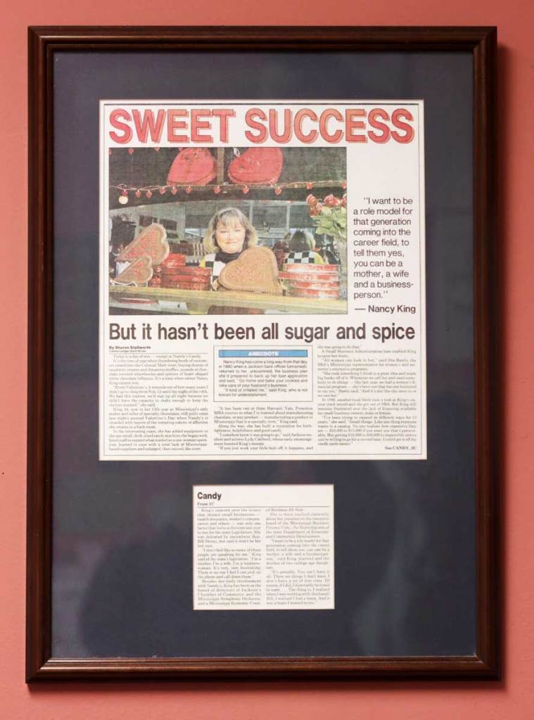 A framed article clipping labeled 'Sweet Success'