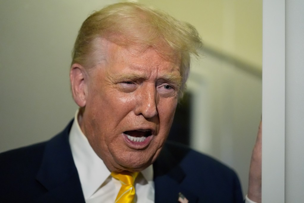 a close up of donald trump speaking