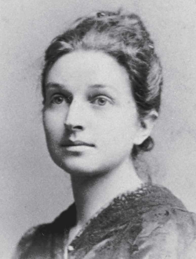 A black-and-white photo of a young woman.