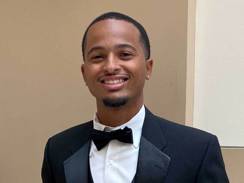 Jaylen Burns dressed in a tuxedo