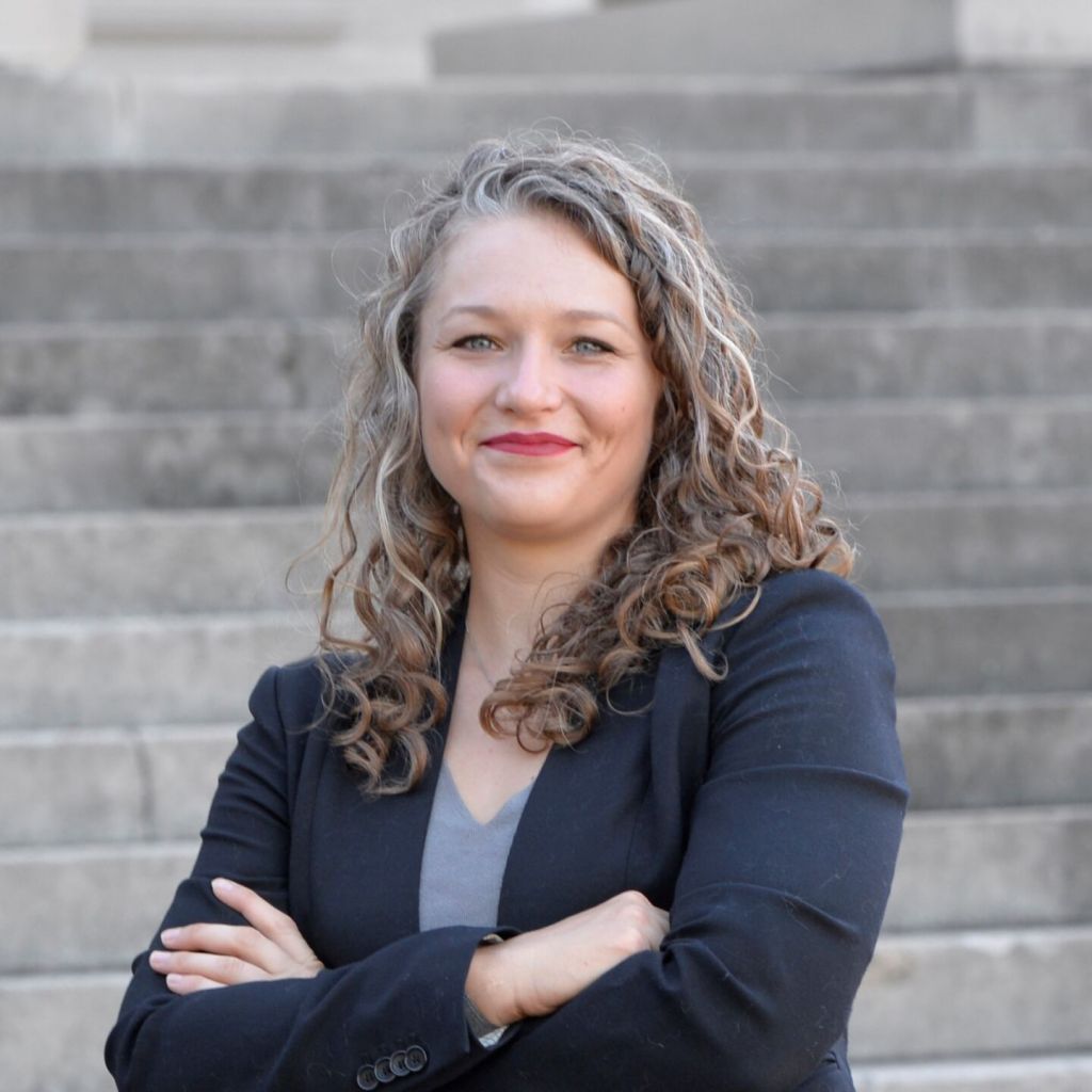 Official headshot of Madalyn Wasilczuk standing outside in front of a staircase