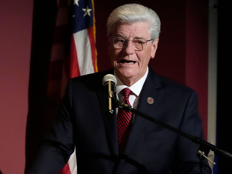 Phil Bryant speaks at a podium