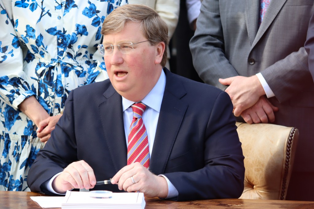 Gov. Tate Reeves speaking at a bill signing