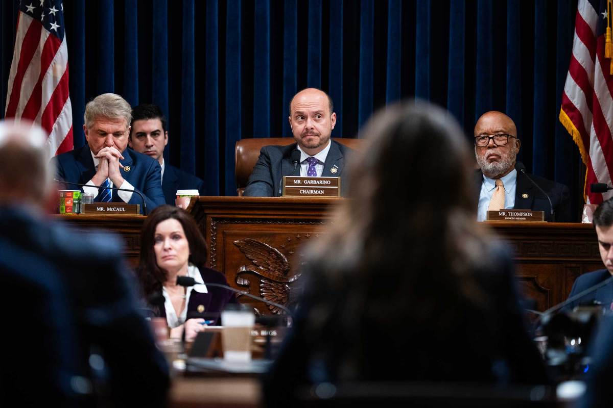 Bennie Thompson and other representatives sit in a committee