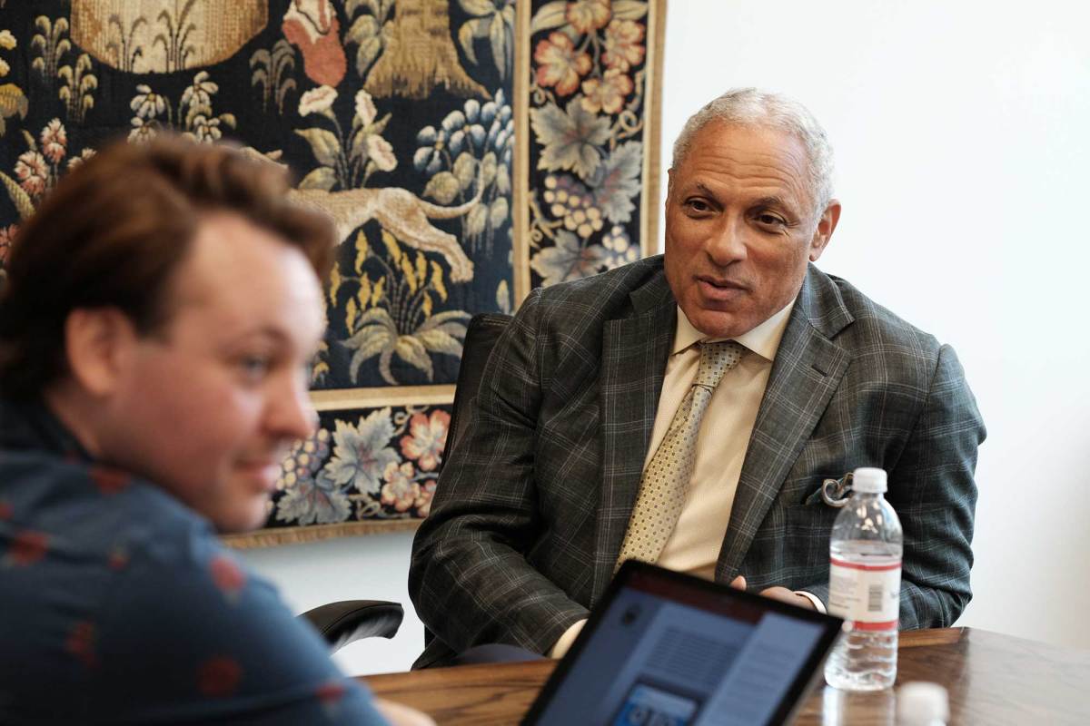 Ashton Pittman seen interviewing Mike Espy