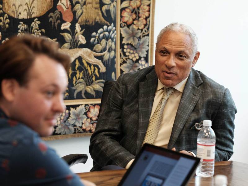 Ashton Pittman seen interviewing Mike Espy