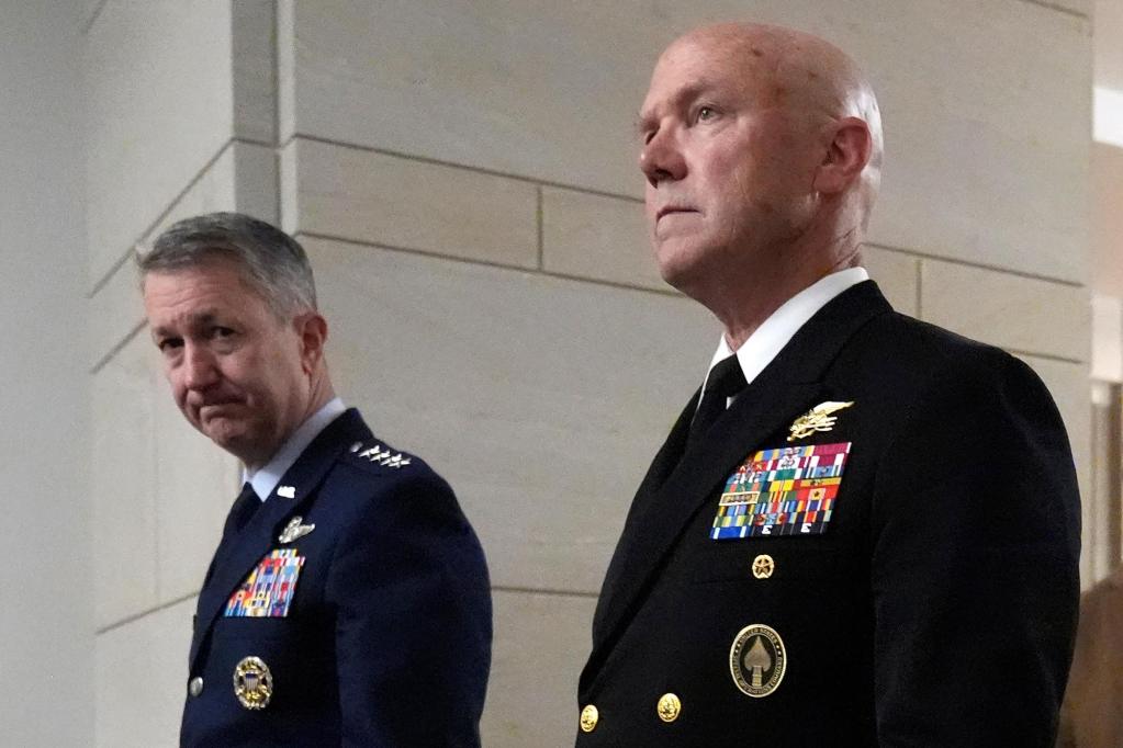 Dan Caine and Frank M. Bradley standing next to each other.