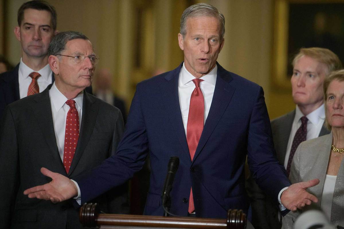 John Thune standing with several senators in the Capitol building