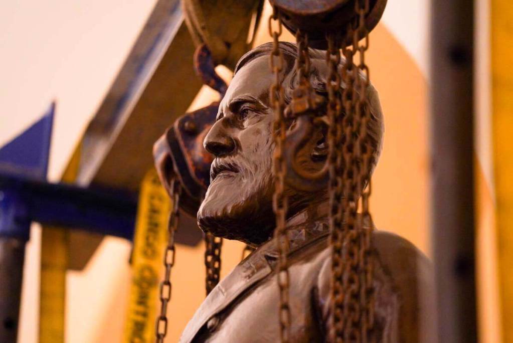A close-up of a bronze Robert E. Lee statue.