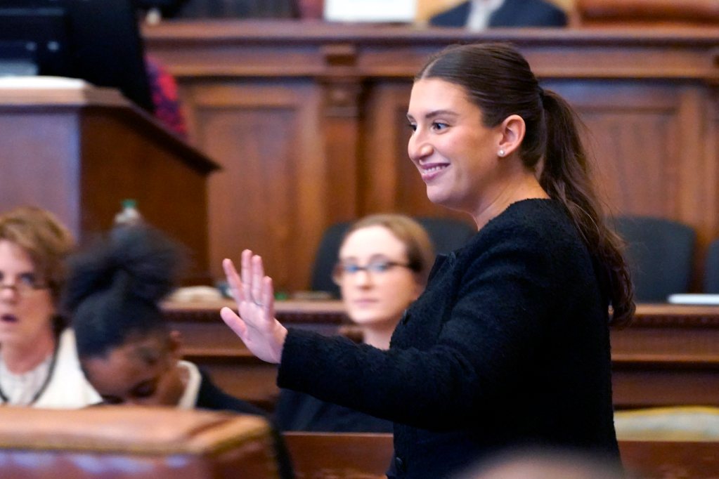 A woman speaking in the senate chambers