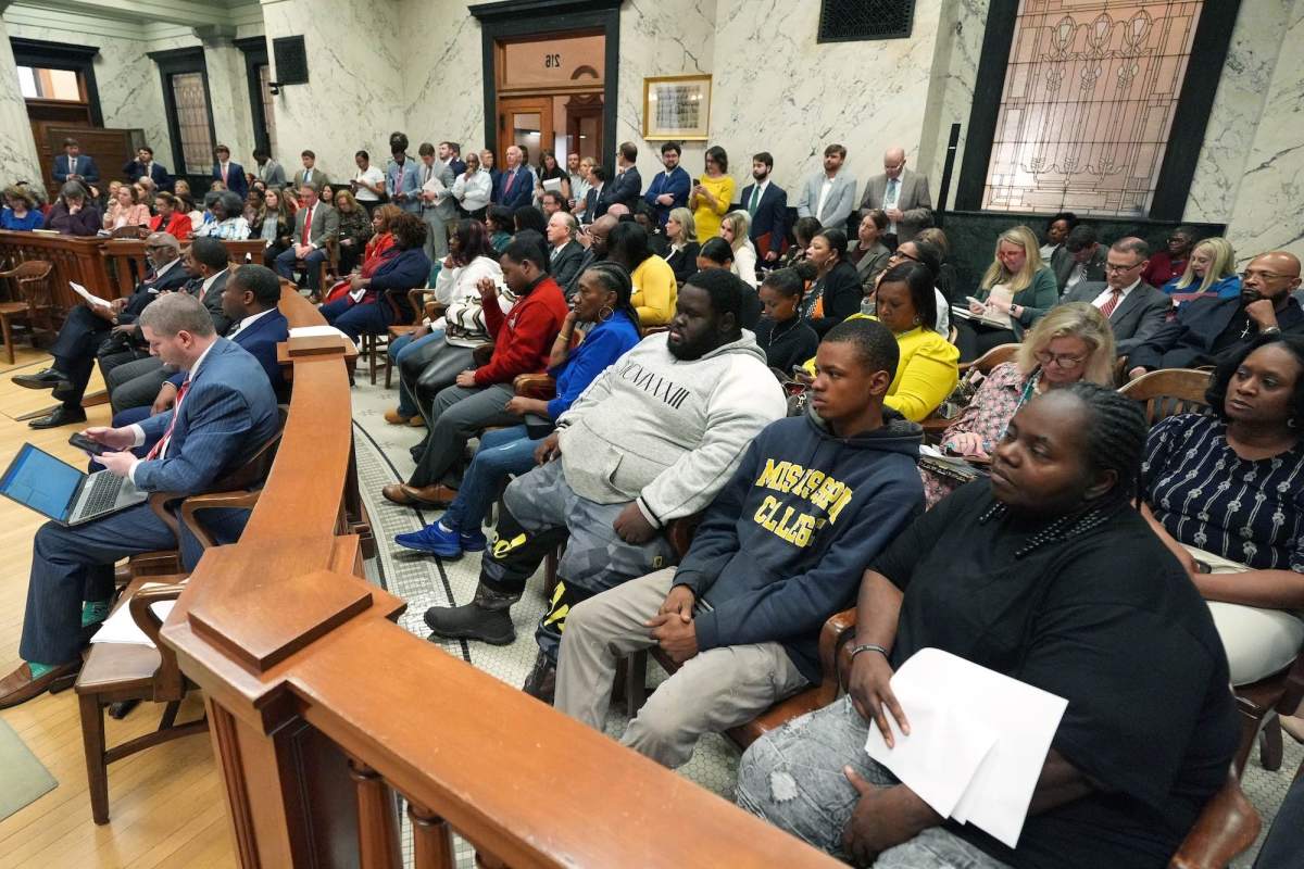 Chamber gallery seats are filed with attendees