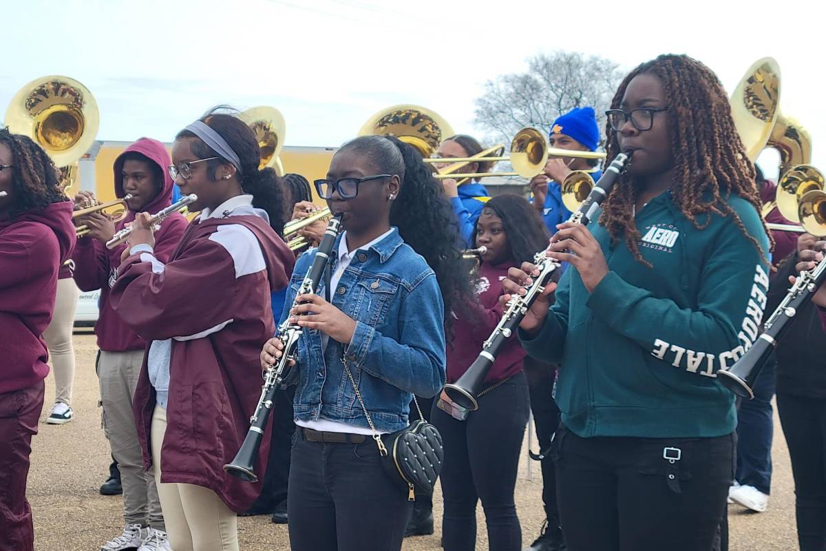 A student band performs outside