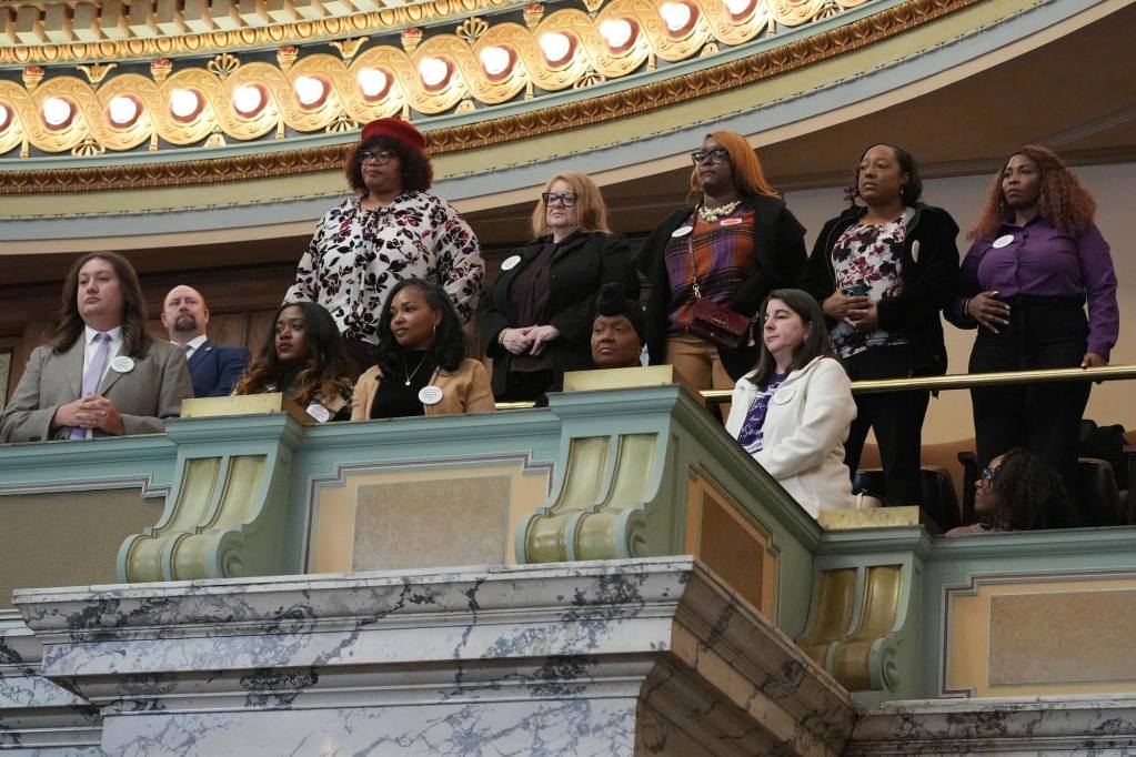People standing in the balcony at the Capital
