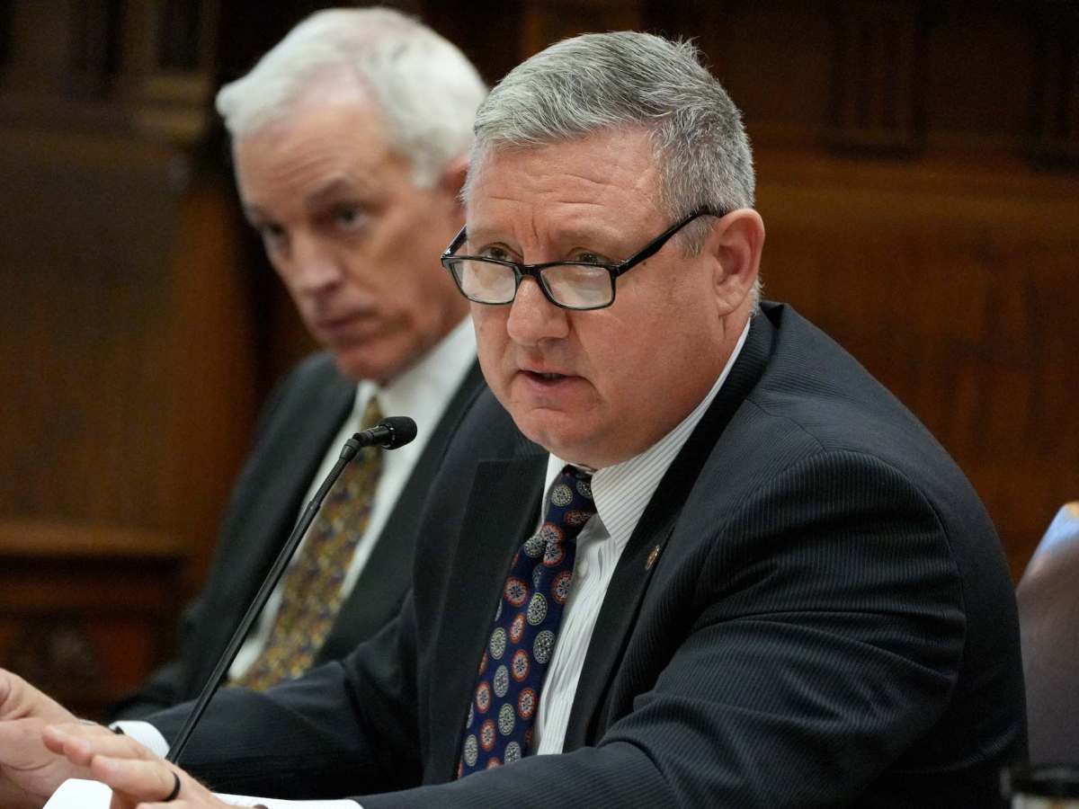 Dennis DeBar Jr. speaks in a committee