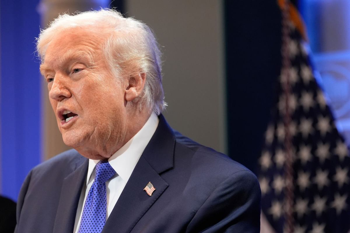 Donald Trump speaking at a briefing