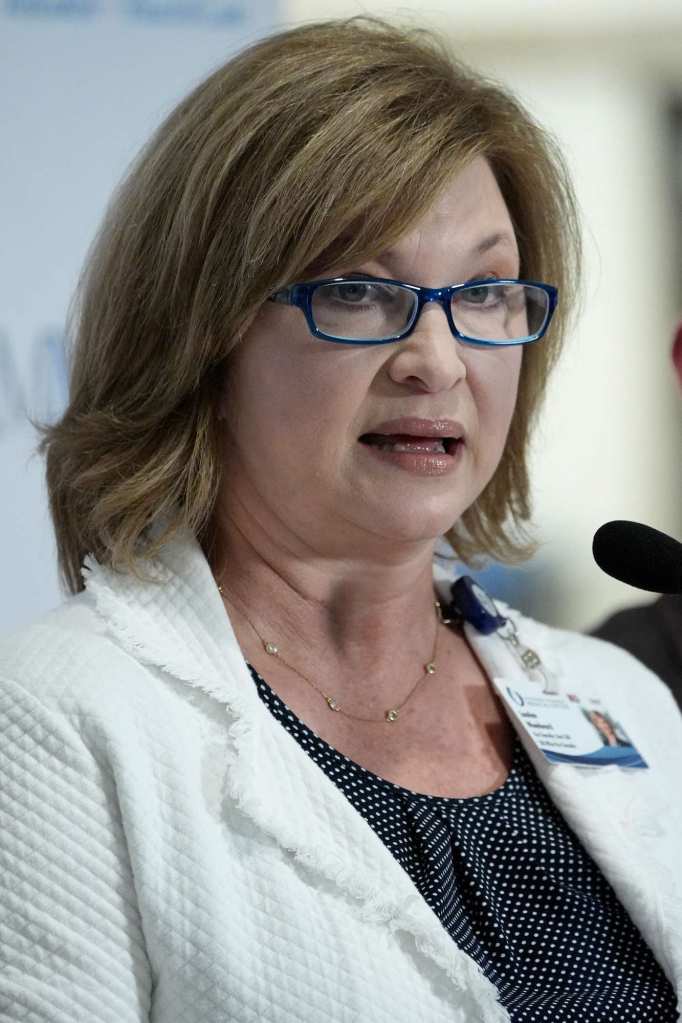 Dr. LouAnn Woodward speaking at a press conference at UMMC