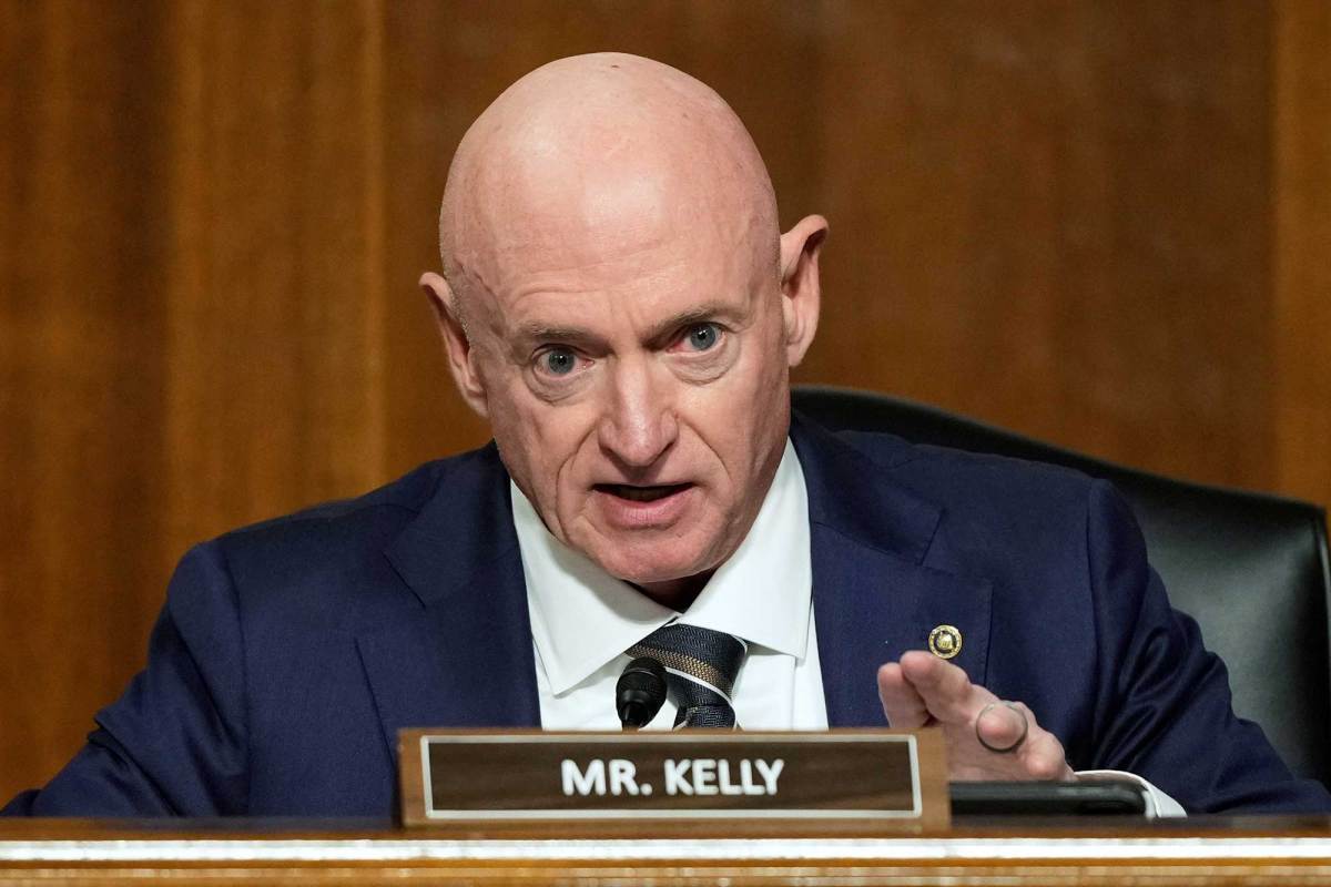 U.S. Sen. Mark Kelly speaking during a hearing.