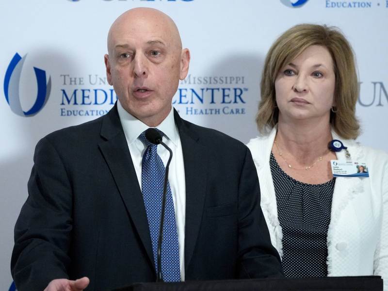 An FBI agent speaks at a press conference at UMMC