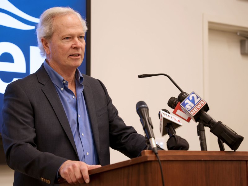 Ted Henifin speaking at a press conference