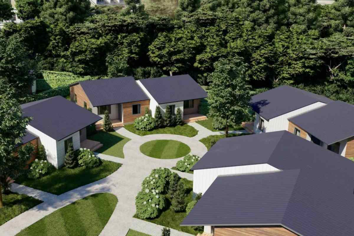 An aerial rendering of small homes in a neighborhood with a circular sidewalk in the middle.