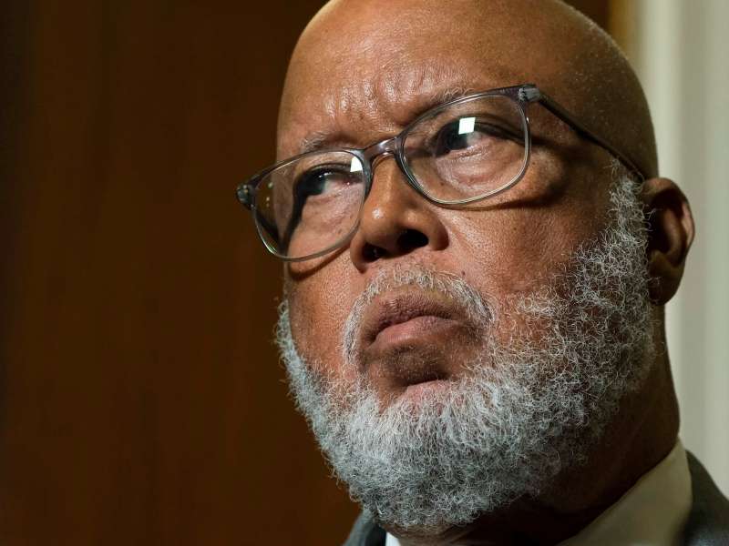 A close up of Bennie Thompson inside a room, listening to something