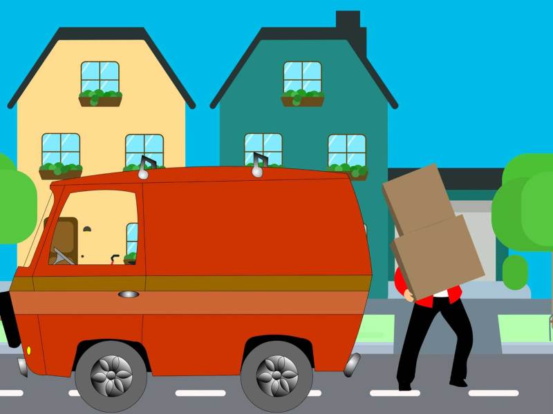 An illustration of an orange van parked in front of two houses, and a person moving boxes out of the van