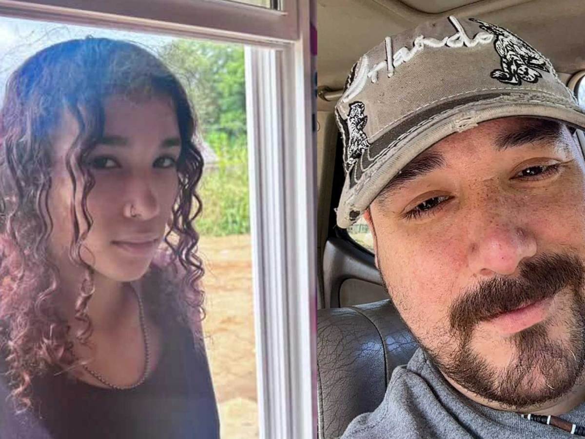 A selfie of a man and his daughter inside a vehicle