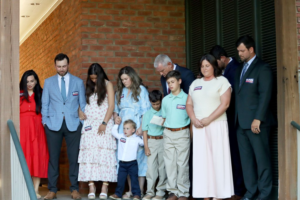 Philip Gunn's family supporting him at an outside event