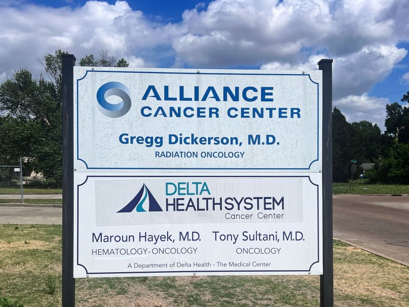 A business sign for Alliance Cancer Center and Delta HealthSystem