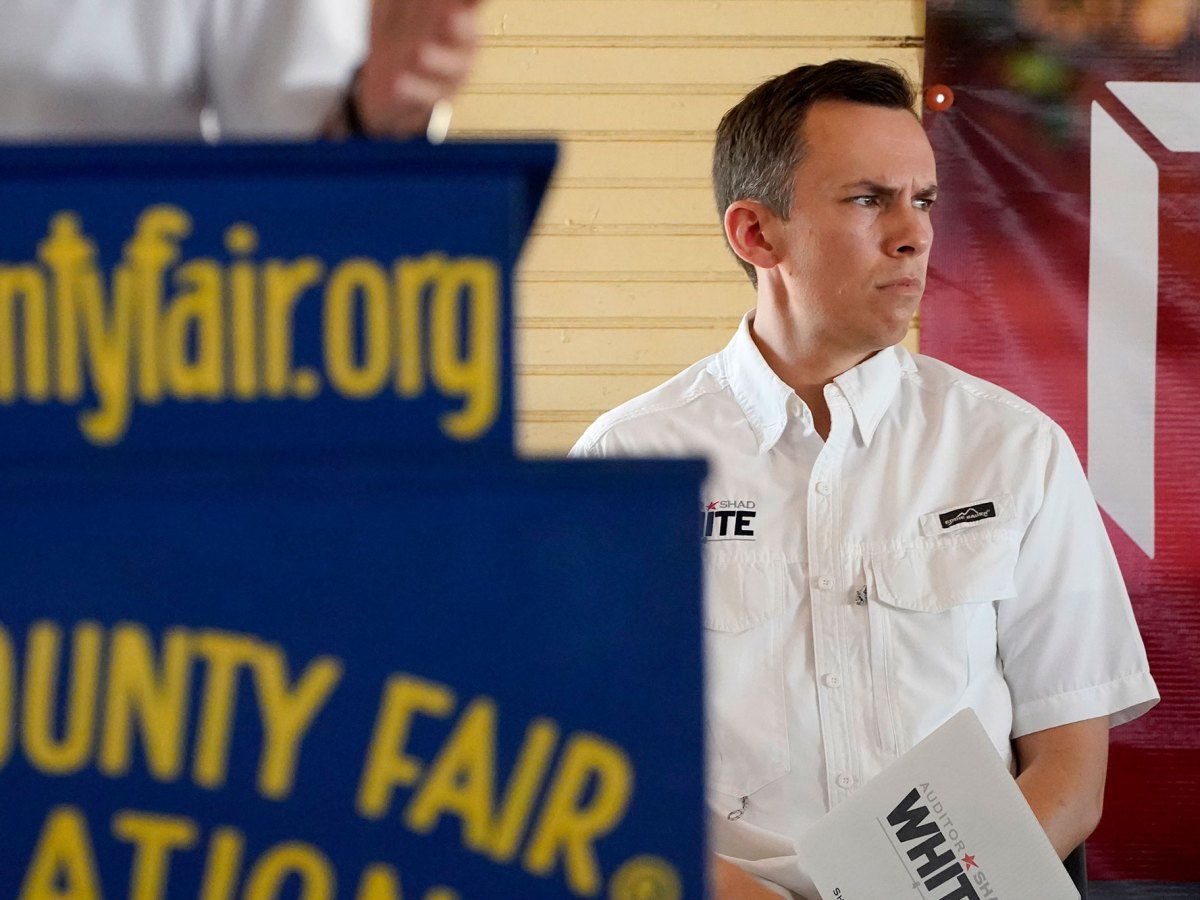State Auditor Shad White stares around the pavilion at the Neshoba County Fair