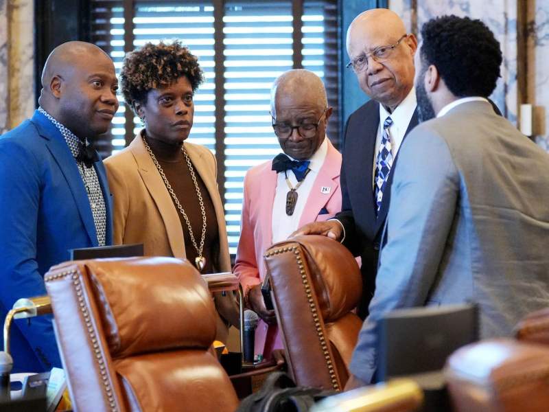 Five members of the Mississippi Democrats gather in chambers to discuss