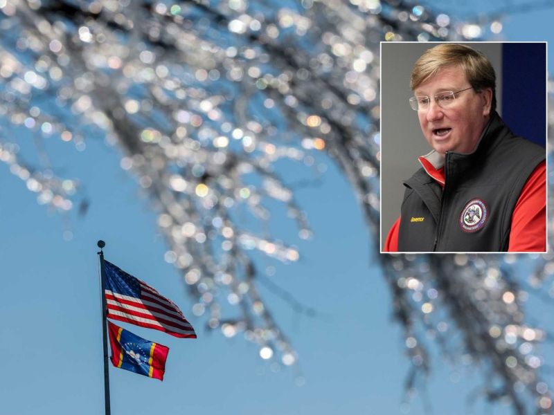 A flagpole with both the US Flag and MS Flag as seen past a tree frosted with ice. Tate Reeves in inset on the top right.