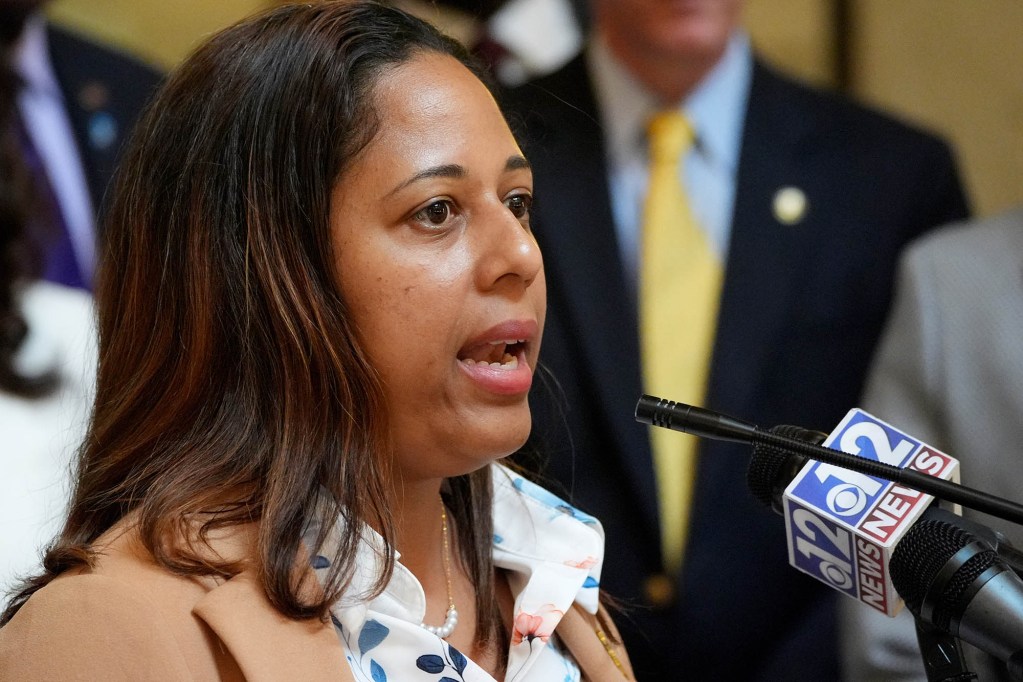 A closeup of Zakiya Summers speaking at a press conference